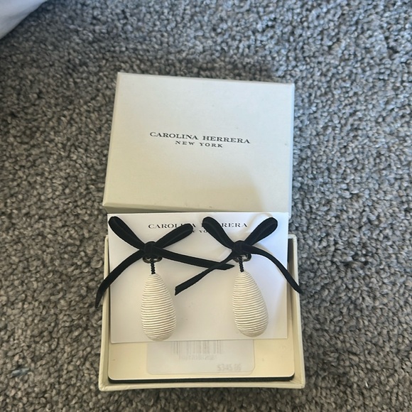 Carolina Herrera Jewelry - Carolina Herrera clip on bow dangle earrings new in box.